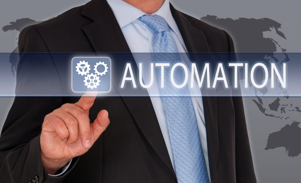 Man pressing a display wall to trigger the automation of his document processes with paperMountains technology